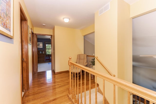 5 Tatiana Ct, Bloomington, IL 61704 - hall with an upstairs landing and light wood finished floors