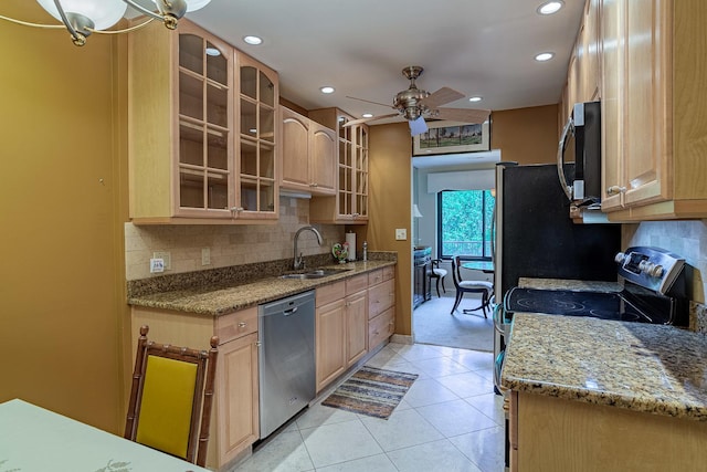 3070 Pheasant Creek Dr Unit 201, Northbrook, IL 60062 - kitchen with stainless steel appliances, recessed lighting, ceiling fan, decorative backsplash, and light tile patterned floors