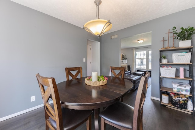 1613 Cutter Ct, Normal, IL 61761 - dining room with dark wood-style floors and a textured ceiling