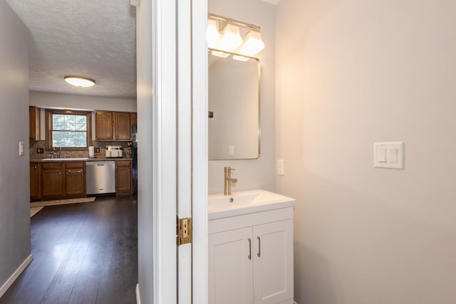 1613 Cutter Ct, Normal, IL 61761 - bathroom featuring vanity, wood-type flooring, and a textured ceiling