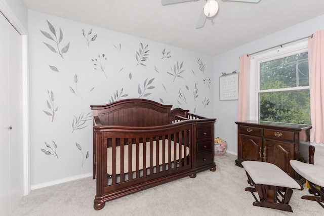 1613 Cutter Ct, Normal, IL 61761 - bedroom with light carpet, a nursery area, and a ceiling fan