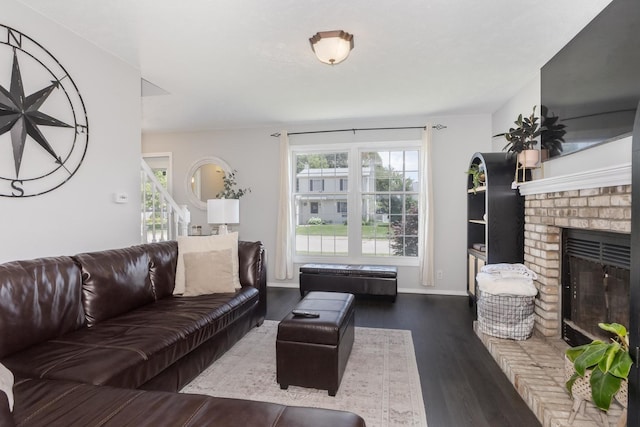 1613 Cutter Ct, Normal, IL 61761 - living area featuring dark wood-style flooring and a brick fireplace