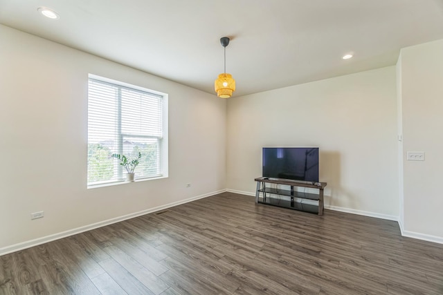 4138 Irving Rd, Aurora, IL 60504 - unfurnished living room featuring dark wood finished floors, baseboards, and recessed lighting