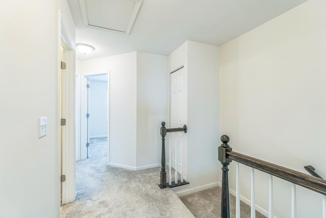 4138 Irving Rd, Aurora, IL 60504 - hall with an upstairs landing, carpet flooring, and baseboards