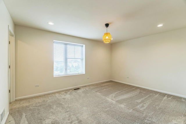 4138 Irving Rd, Aurora, IL 60504 - carpeted spare room featuring baseboards and recessed lighting