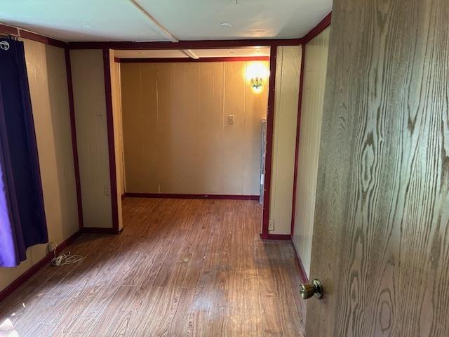 1904 Roberts St, Wilmington, IL 60481 - corridor featuring wood finished floors