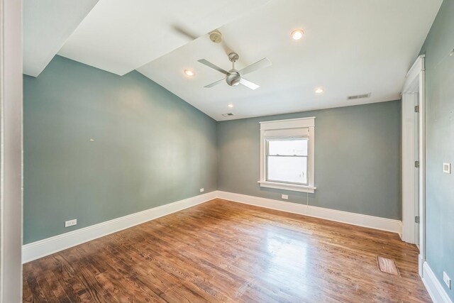 4248 N Sawyer Ave, Chicago, IL 60618 - spare room featuring a ceiling fan, wood finished floors, baseboards, vaulted ceiling, and recessed lighting