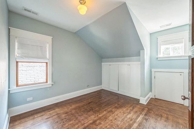 4248 N Sawyer Ave, Chicago, IL 60618 - additional living space featuring lofted ceiling, wood finished floors, and baseboards