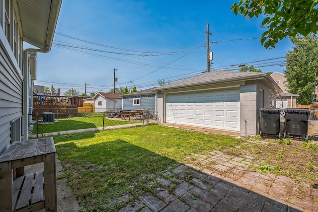 4248 N Sawyer Ave, Chicago, IL 60618 - view of yard featuring a detached garage, an outdoor structure, and cooling unit