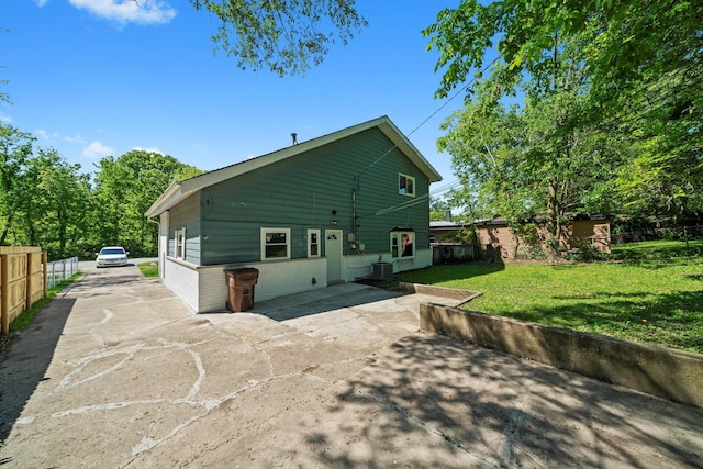 176 Monee Rd, Park Forest, IL 60466 - rear view of house with cooling unit and a patio