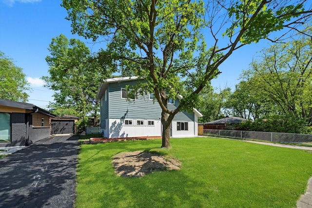 176 Monee Rd, Park Forest, IL 60466 - view of front facade with a garage and driveway