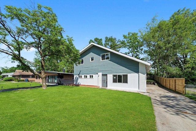 176 Monee Rd, Park Forest, IL 60466 - back of house featuring driveway