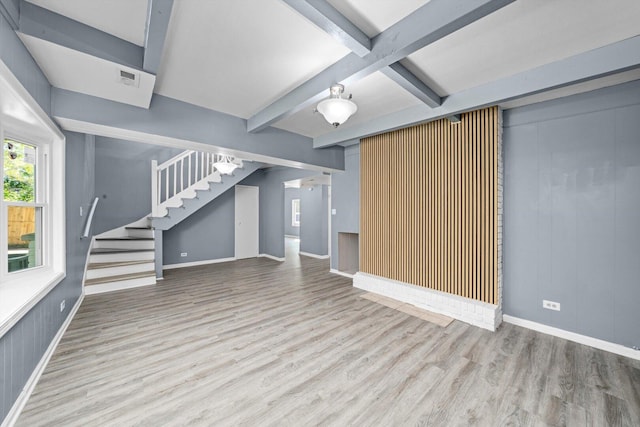 176 Monee Rd, Park Forest, IL 60466 - unfurnished living room with stairway, wood finished floors, beam ceiling, and baseboards