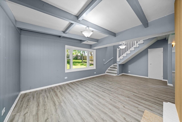 176 Monee Rd, Park Forest, IL 60466 - unfurnished living room with wood finished floors, stairs, beam ceiling, and baseboards