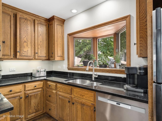 739 N E Ave, Oak Park, IL 60302 - kitchen with stainless steel appliances, a sink, and brown cabinets