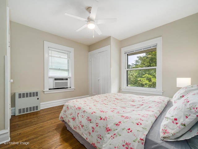 739 N E Ave, Oak Park, IL 60302 - bedroom with radiator heating unit, hardwood / wood-style floors, cooling unit, baseboards, and ceiling fan