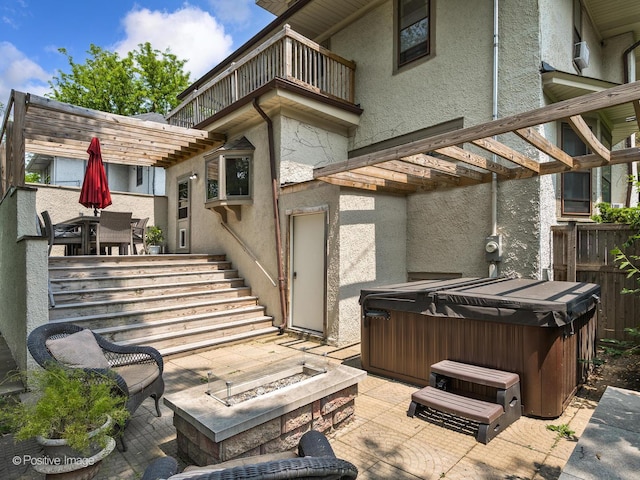 739 N E Ave, Oak Park, IL 60302 - view of patio / terrace with a hot tub, a balcony, outdoor dining space, a fire pit, and a pergola