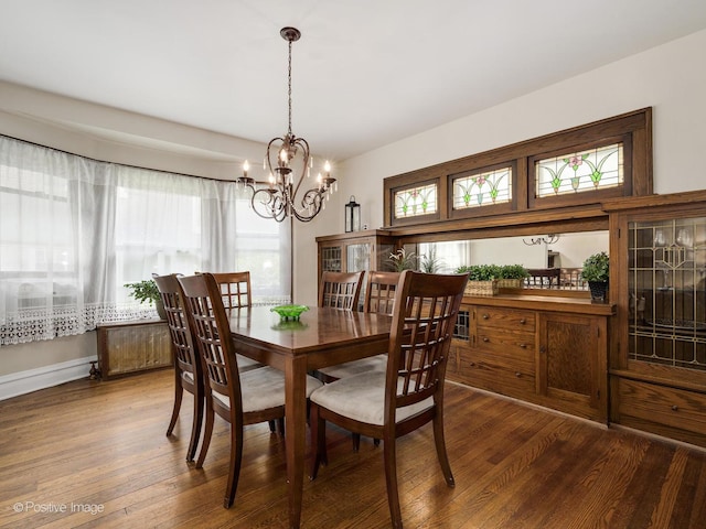 739 N E Ave, Oak Park, IL 60302 - dining room featuring wood-type flooring and a chandelier
