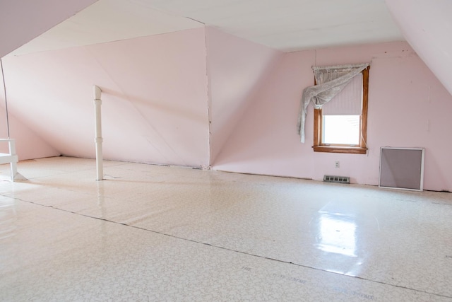 4948 S Lamon Ave, Chicago, IL 60638 - bonus room featuring lofted ceiling and speckle patterned floor