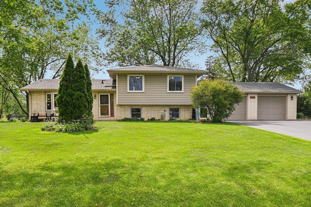 36746 N Eastmoor Ave, Lake Villa, IL 60046 - split level home with brick siding, a front lawn, asphalt driveway, and an attached garage