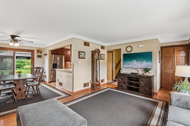 36746 N Eastmoor Ave, Lake Villa, IL 60046 - living room featuring light wood-style flooring and a ceiling fan