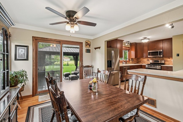 36746 N Eastmoor Ave, Lake Villa, IL 60046 - dining area with light wood-style flooring and ceiling fan