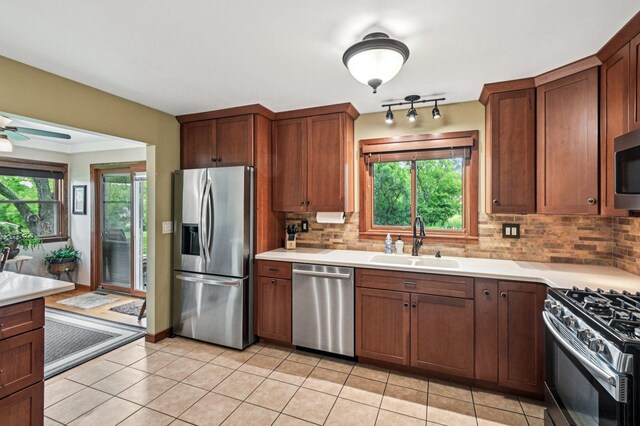 36746 N Eastmoor Ave, Lake Villa, IL 60046 - kitchen with appliances with stainless steel finishes, tasteful backsplash, and light countertops