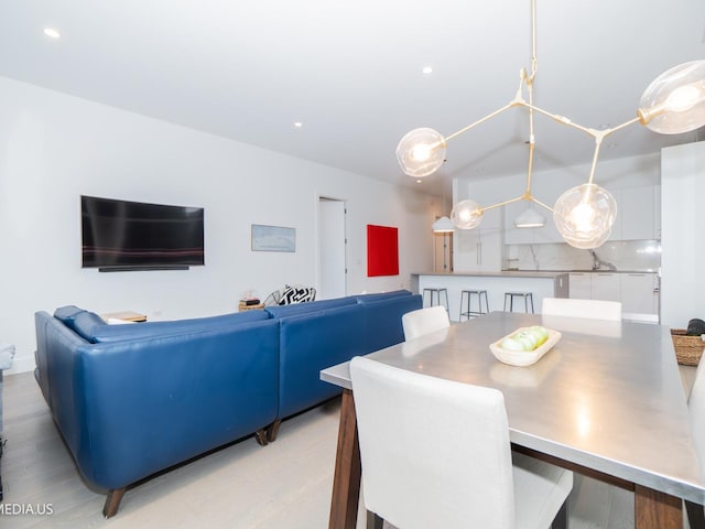367 W Locust St Unit 202, Chicago, IL 60610 - dining room featuring light wood finished floors and recessed lighting