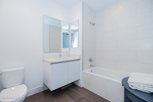 367 W Locust St Unit 202, Chicago, IL 60610 - bathroom with toilet, vanity, tile patterned flooring, and tiled shower / bath combo