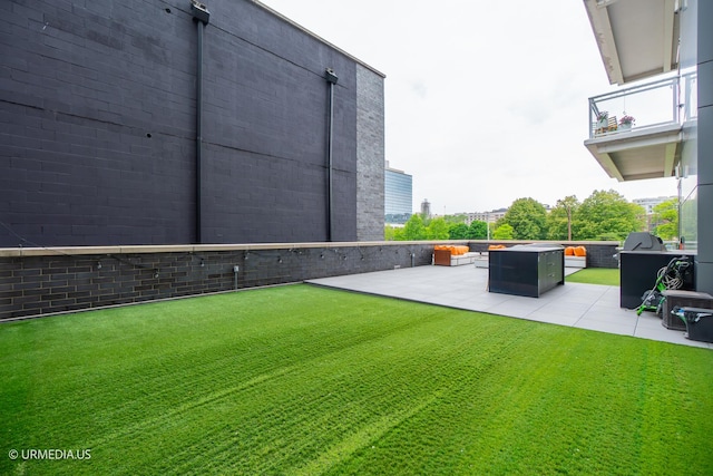 367 W Locust St Unit 202, Chicago, IL 60610 - view of grassy yard with a patio area