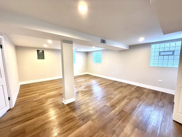 14409 Kimbark Ave, Dolton, IL 60419 - below grade area with wood finished floors, baseboards, and recessed lighting