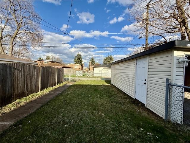 14409 Kimbark Ave, Dolton, IL 60419 - view of yard featuring an outdoor structure