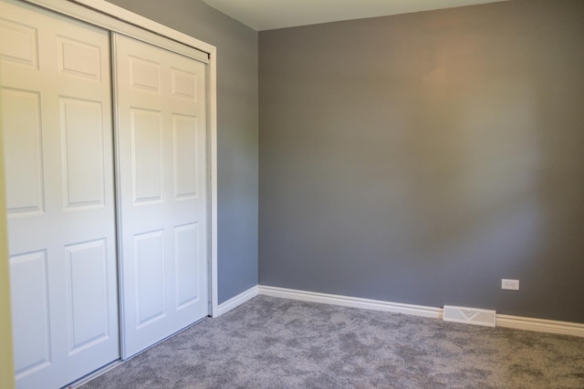 34 E 159th St, South Holland, IL 60473 - unfurnished bedroom featuring carpet flooring, baseboards, and a closet