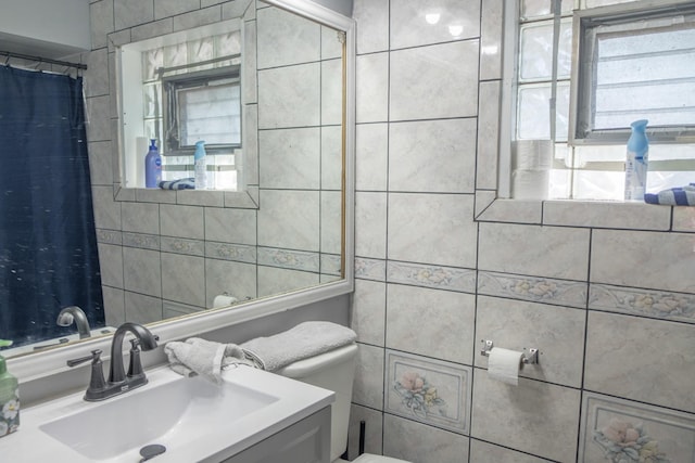 34 E 159th St, South Holland, IL 60473 - full bath with toilet, vanity, tile walls, and plenty of natural light