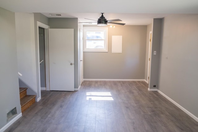 34 E 159th St, South Holland, IL 60473 - empty room with wood finished floors, a ceiling fan, baseboards, and stairs