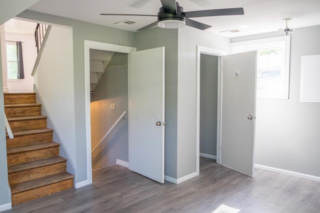 34 E 159th St, South Holland, IL 60473 - staircase featuring wood finished floors, ceiling fan, and baseboards