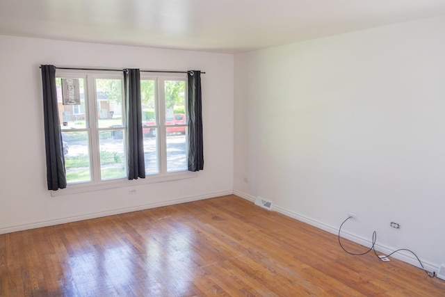 34 E 159th St, South Holland, IL 60473 - unfurnished room featuring light wood-style flooring and baseboards