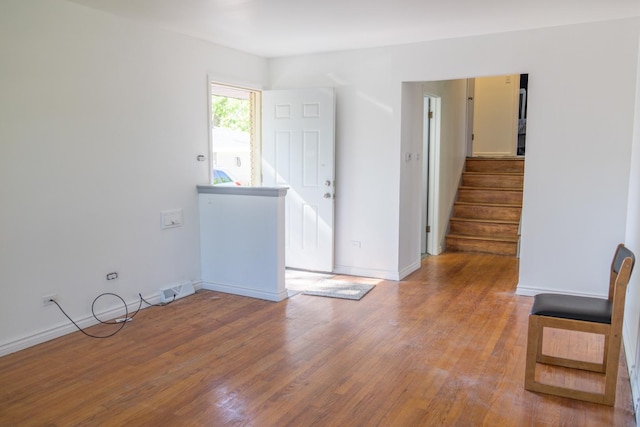 34 E 159th St, South Holland, IL 60473 - spare room with wood finished floors, stairs, and baseboards
