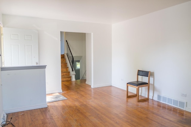 34 E 159th St, South Holland, IL 60473 - empty room featuring wood finished floors, stairway, and baseboards