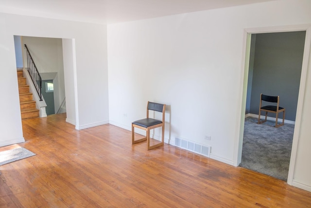 34 E 159th St, South Holland, IL 60473 - unfurnished room featuring wood finished floors, stairs, and baseboards
