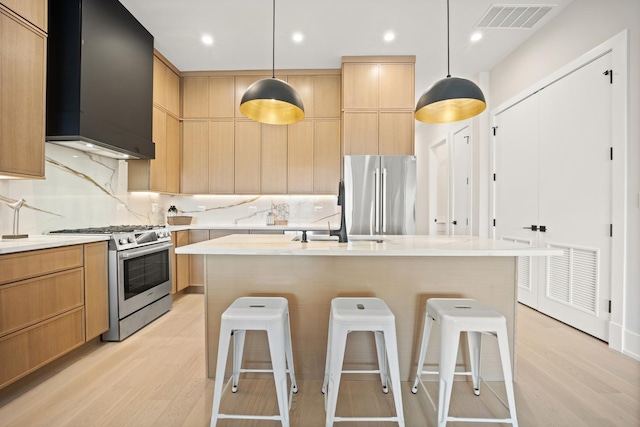 4343 N Richmond Ave Unit 3N, Chicago, IL 60618 - kitchen with appliances with stainless steel finishes, light wood finished floors, light countertops, and recessed lighting