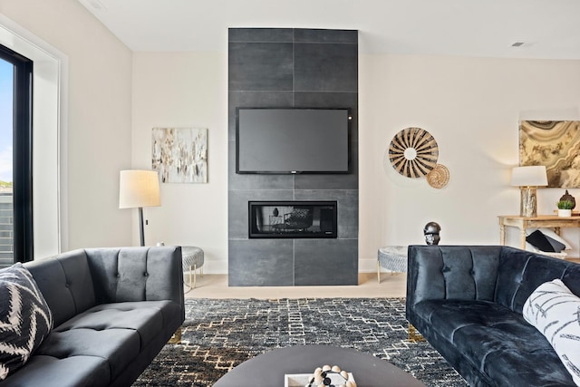 4343 N Richmond Ave Unit 3N, Chicago, IL 60618 - living area with a fireplace, baseboards, and wood finished floors