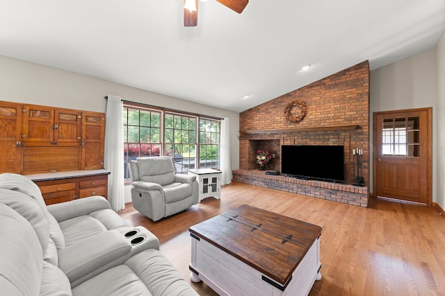 1527 62nd St, Downers Grove, IL 60516 - living area with vaulted ceiling, a brick fireplace, light wood-style floors, and ceiling fan