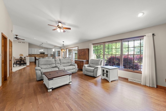 1527 62nd St, Downers Grove, IL 60516 - living room featuring ceiling fan, lofted ceiling, and wood finished floors