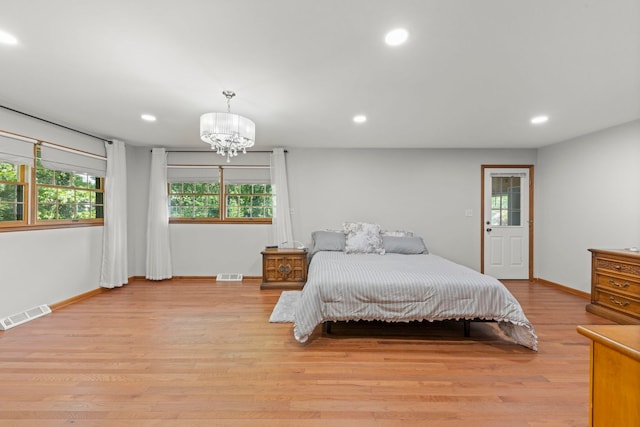 1527 62nd St, Downers Grove, IL 60516 - bedroom featuring a chandelier, multiple windows, light wood-style flooring, and recessed lighting