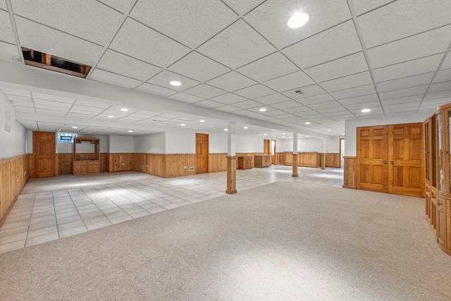 1527 62nd St, Downers Grove, IL 60516 - finished below grade area featuring a wainscoted wall, wooden walls, recessed lighting, light colored carpet, and a drop ceiling