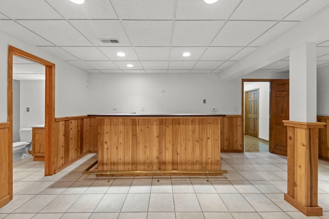 1527 62nd St, Downers Grove, IL 60516 - indoor wet bar with a wainscoted wall, a paneled ceiling, recessed lighting, wooden walls, and light tile patterned floors