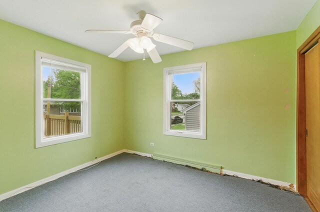 2236 Thornton Lansing Rd, Lansing, IL 60438 - carpeted spare room with baseboards and ceiling fan