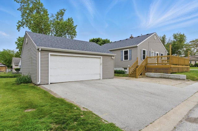 2236 Thornton Lansing Rd, Lansing, IL 60438 - view of front facade with a deck, a front lawn, a shingled roof, and a garage