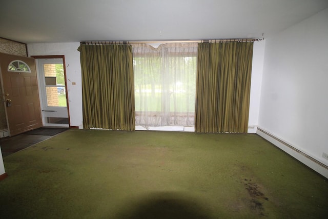 20340 Keeler Ave, Matteson, IL 60443 - carpeted empty room featuring a baseboard heating unit